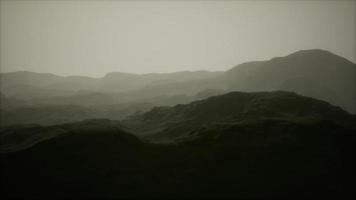 landscape of the Dolomites Mountain Range covered in the fog video