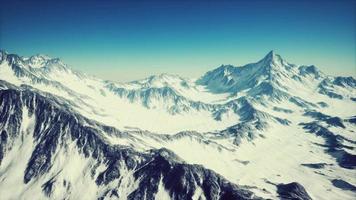 panoramic mountain view of snow capped peaks and glaciers video