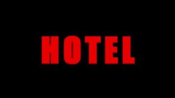 video motel testo rosso neon su sfondo nero