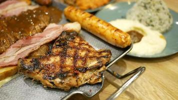 beef steaks meat with vegetables on a plate video