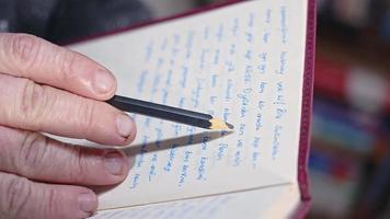 Close-up of Senior Man Hands Checking Text Footage video