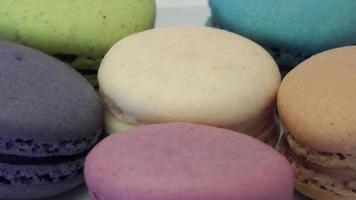 Colorful Macaron French Macaroon Rotating on a Black Background Footage video
