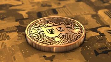 roterande guld bitcoins, kryptovaluta, 4k 3d-rendering video