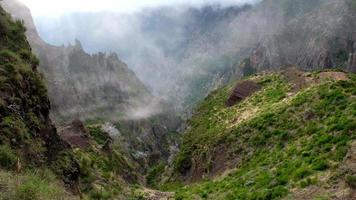 Amazing mountain view looking at the valley with passing clouds. Travel the world. Hiking in the mountains. Beautiful and inspiring nature. Relaxing and enjoyable feeling. Madeira Island, Portugal. video