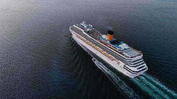 Aerial view of beautiful white cruise ship above luxury cruise in the ocean sea  concept tourism travel on holiday take a vacation time on summer. video