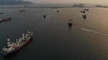 Aerial view of  gas ship around international terminal ship port. video