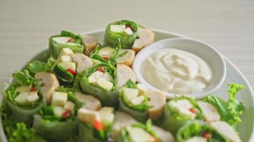 vegetables wrap or salad rolls with creamy salad sauce - Healthy food style
