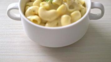 macaroni and cheese with herbs in bowl video