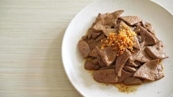 homemade stir-fried pork liver with garlic on plate video