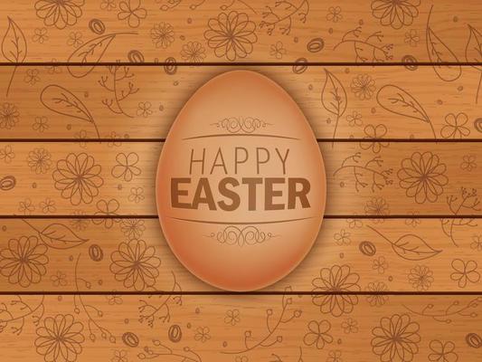 Easter brown egg on wooden background