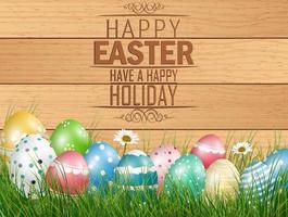 Happy Easter background with colored eggs on grass with flower on wooden background vector