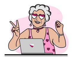 Happy granny with laptop. A fashionable modern old woman in glasses and a pink swimsuit.