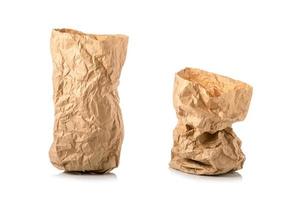 Crumpled brown paper bag for food. Studio shot isolated on white photo