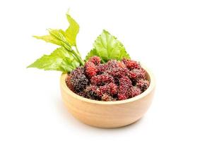 Fresh Mulberry with green leaf isolated on white background photo