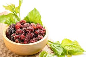 Fresh Mulberry with green leaf isolated on white background photo