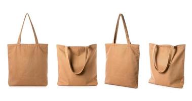 New blank brown cotton bag isolated on white photo