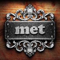 met word of iron on wooden background photo