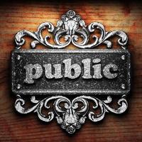 public word of iron on wooden background photo