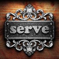 serve word of iron on wooden background photo