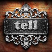 tell word of iron on wooden background photo