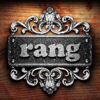 rang word of iron on wooden background photo