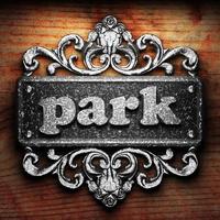 park word of iron on wooden background photo