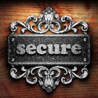secure word of iron on wooden background photo