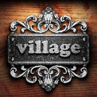 village word of iron on wooden background photo