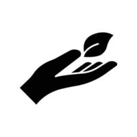 Hand with leaf icon. glyph style. silhouette. suitable for ecology icon. simple design editable. Design template vector