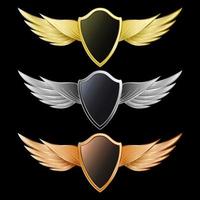 Set gold, silver and bronze shield with wings realistic emblem isolated vector