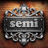 semi word of iron on wooden background photo