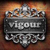 vigour word of iron on wooden background photo