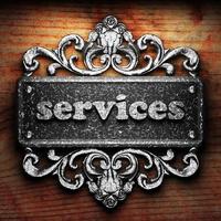 services word of iron on wooden background photo