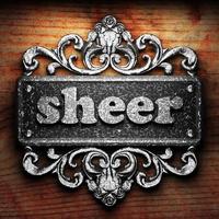 sheer word of iron on wooden background photo
