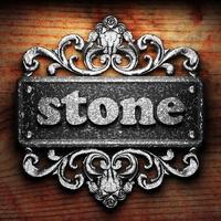 stone word of iron on wooden background photo