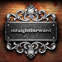 straightforward word of iron on wooden background photo