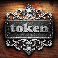 token word of iron on wooden background photo