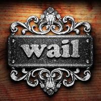 wail word of iron on wooden background photo