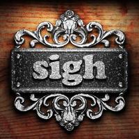 sigh word of iron on wooden background photo