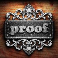 proof word of iron on wooden background photo