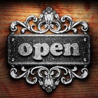 open word of iron on wooden background photo