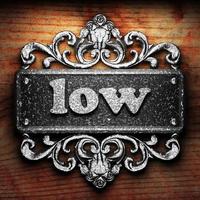 low word of iron on wooden background photo