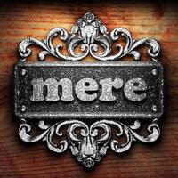 mere word of iron on wooden background photo