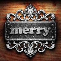 merry word of iron on wooden background photo