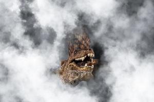 dinosaurio dimetrodon sobre fondo de humo foto
