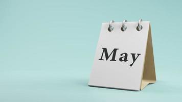 Mayo en la representación 3d del calendario de escritorio de papel foto
