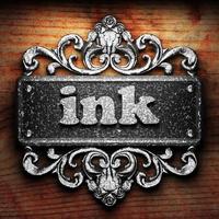 ink word of iron on wooden background photo