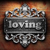 loving word of iron on wooden background photo