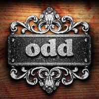 odd word of iron on wooden background photo