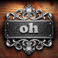 oh word of iron on wooden background photo